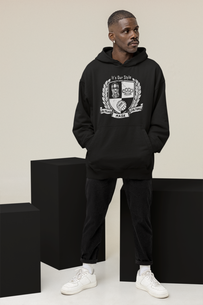 unisex hoodie mockup featuring a cool man posing at a studio m26236