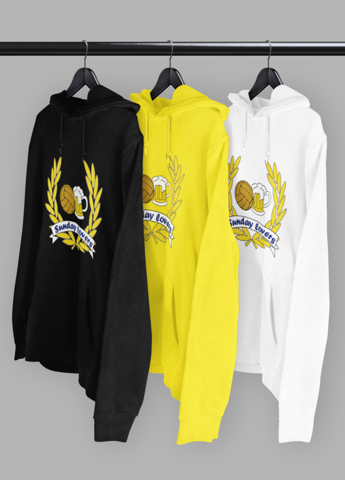 mockup of three pullover hoodies hanging from a rack